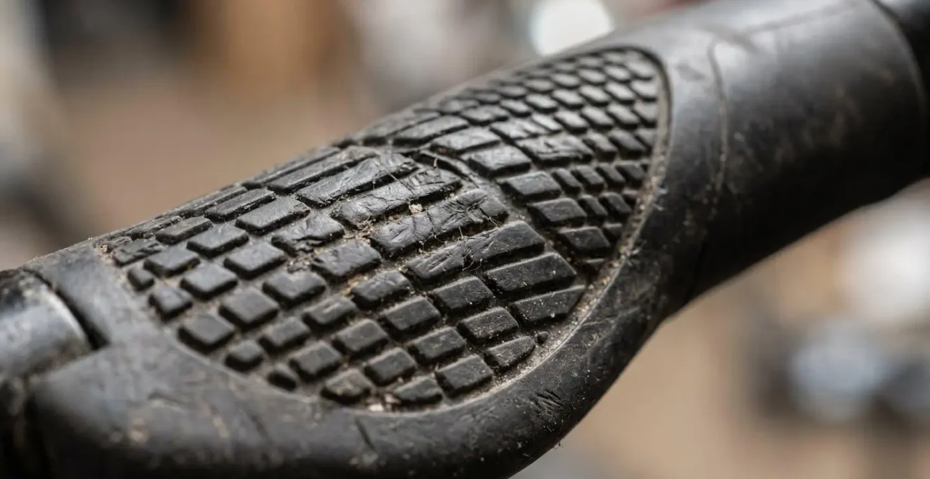Extreme close-up of handlebar grip texture showing natural rubber patterns and micro-detail surface